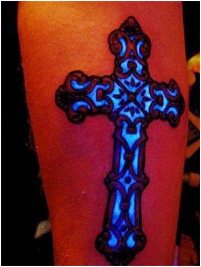 Cross glow tattoo