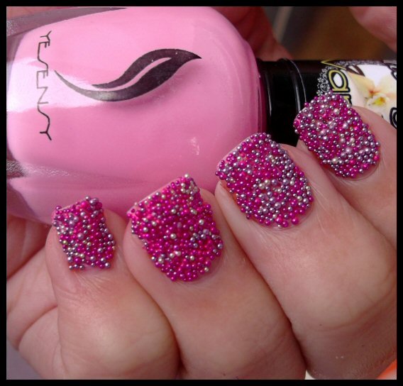 Pink decorated nails