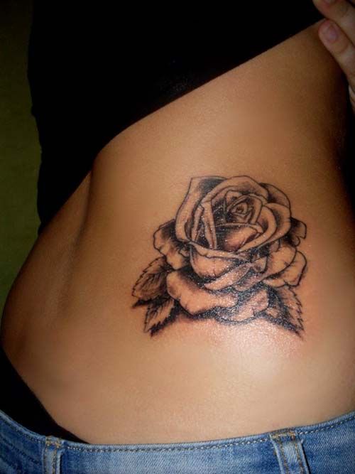 Upper waist rose tattoo