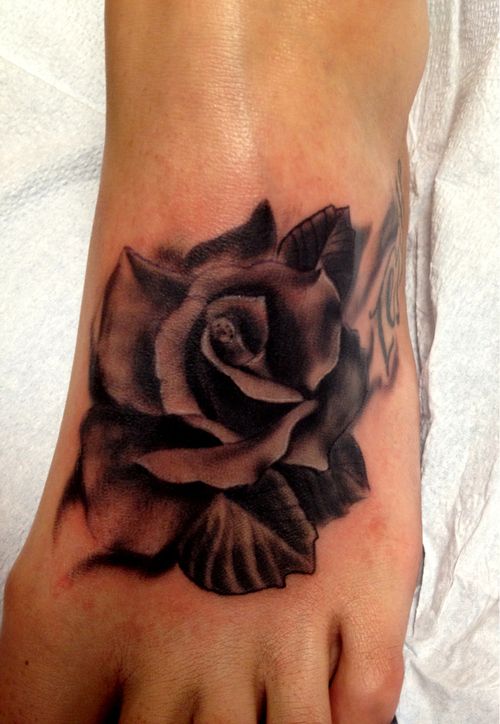 Fantastic rose tattoo