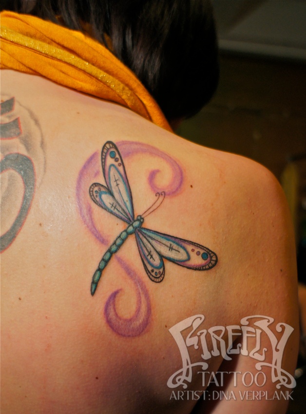 Dragonfly tattoo on the shoulder