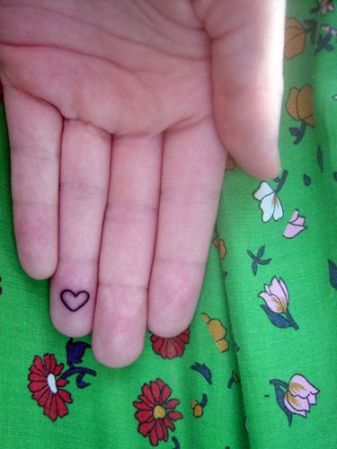 Heart tattoo on finger