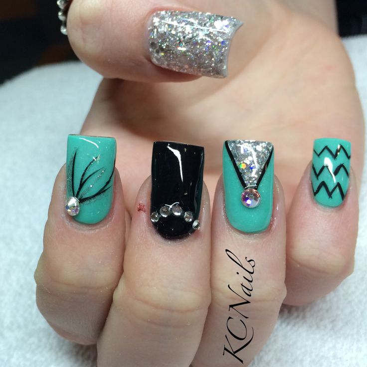 Blue-green nails with rivets