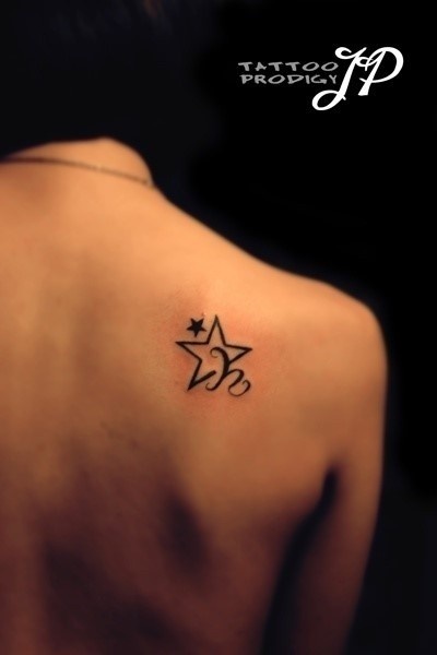 Star tattoo on the back