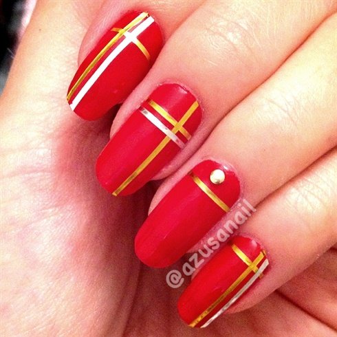 Red and gold nails art design