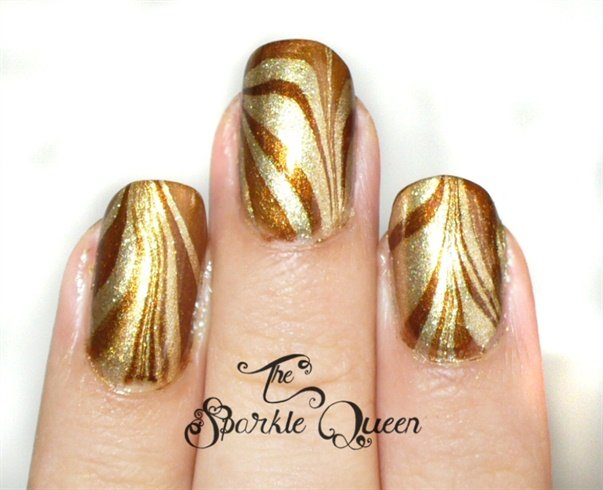 Golden textured nail art design