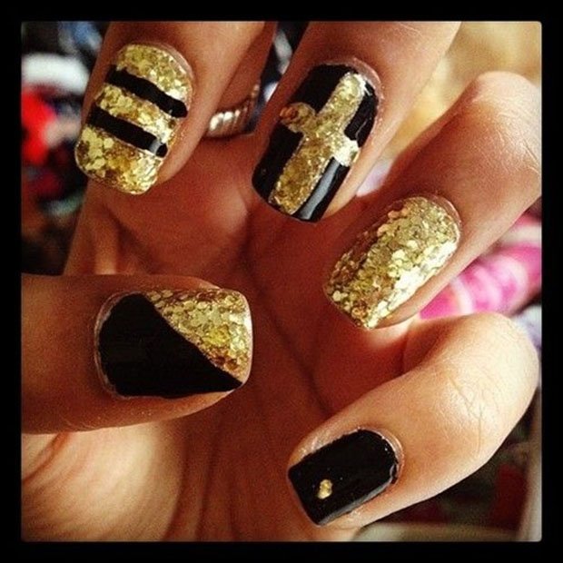 Black and gold decorated nails art design
