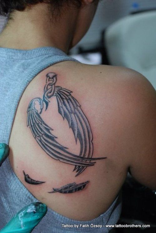 Pretty angel wing tattoo
