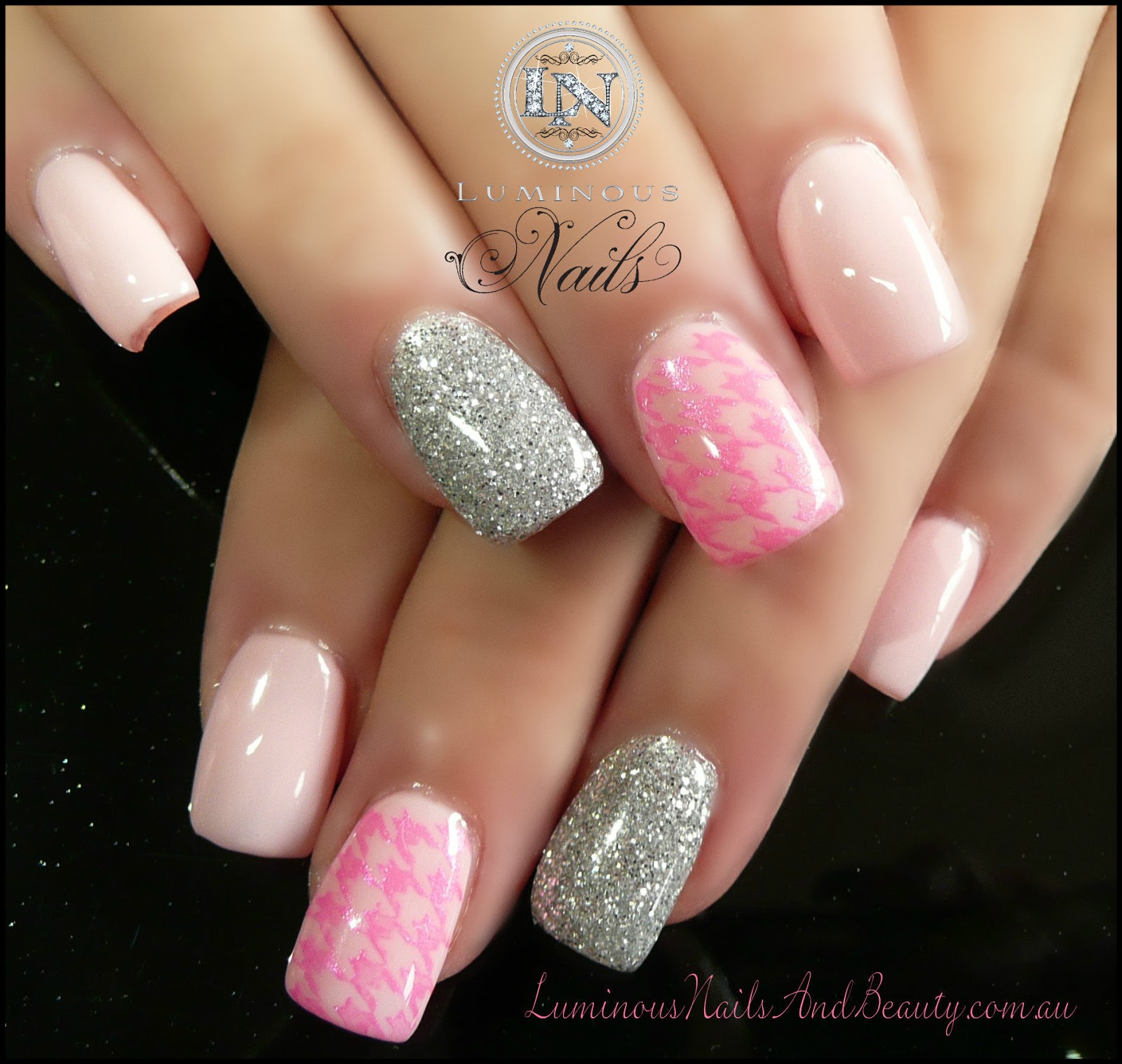 Pink and silver glittery nail design