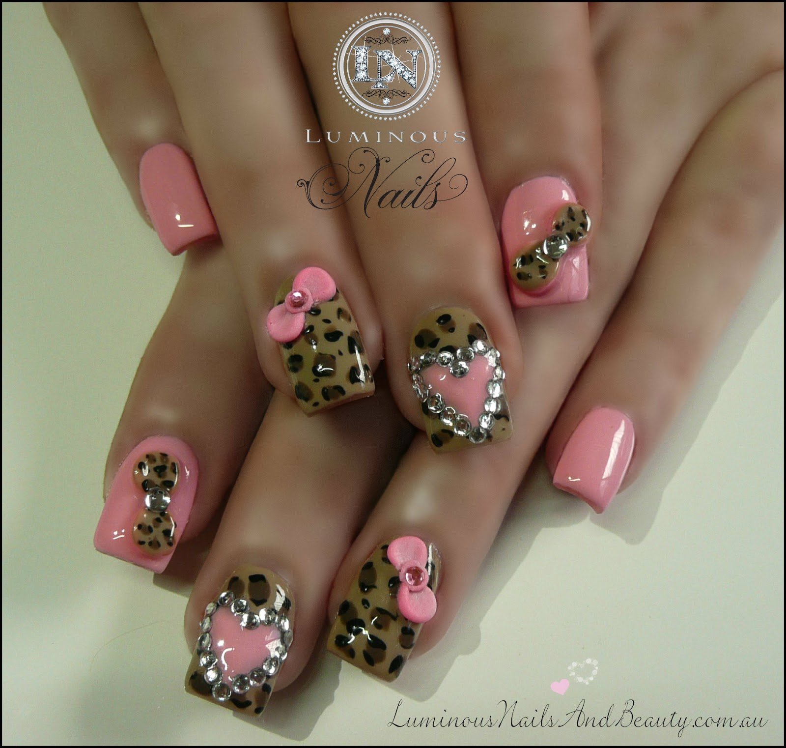 Pink leopard print nail design