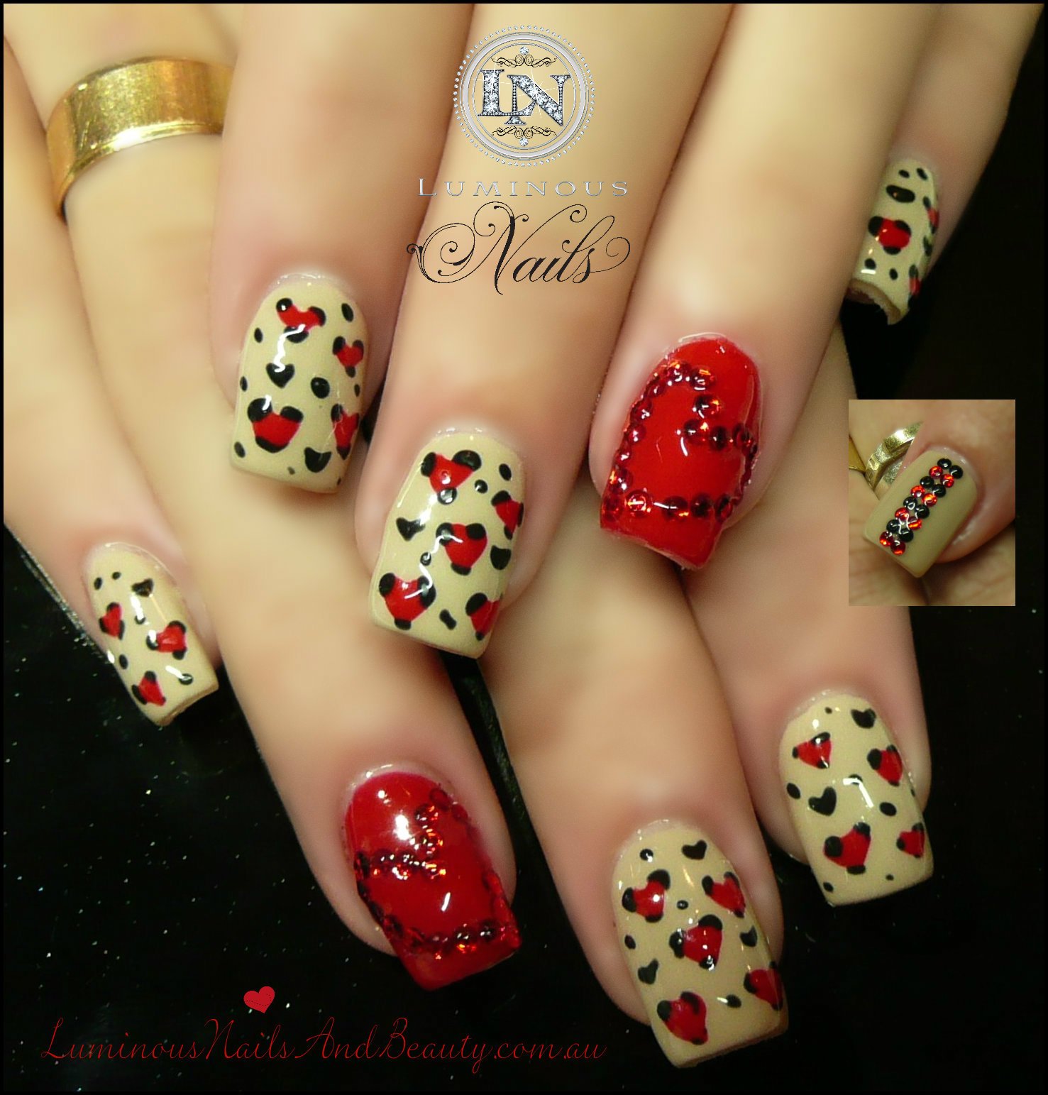 Red and nude heart nail design