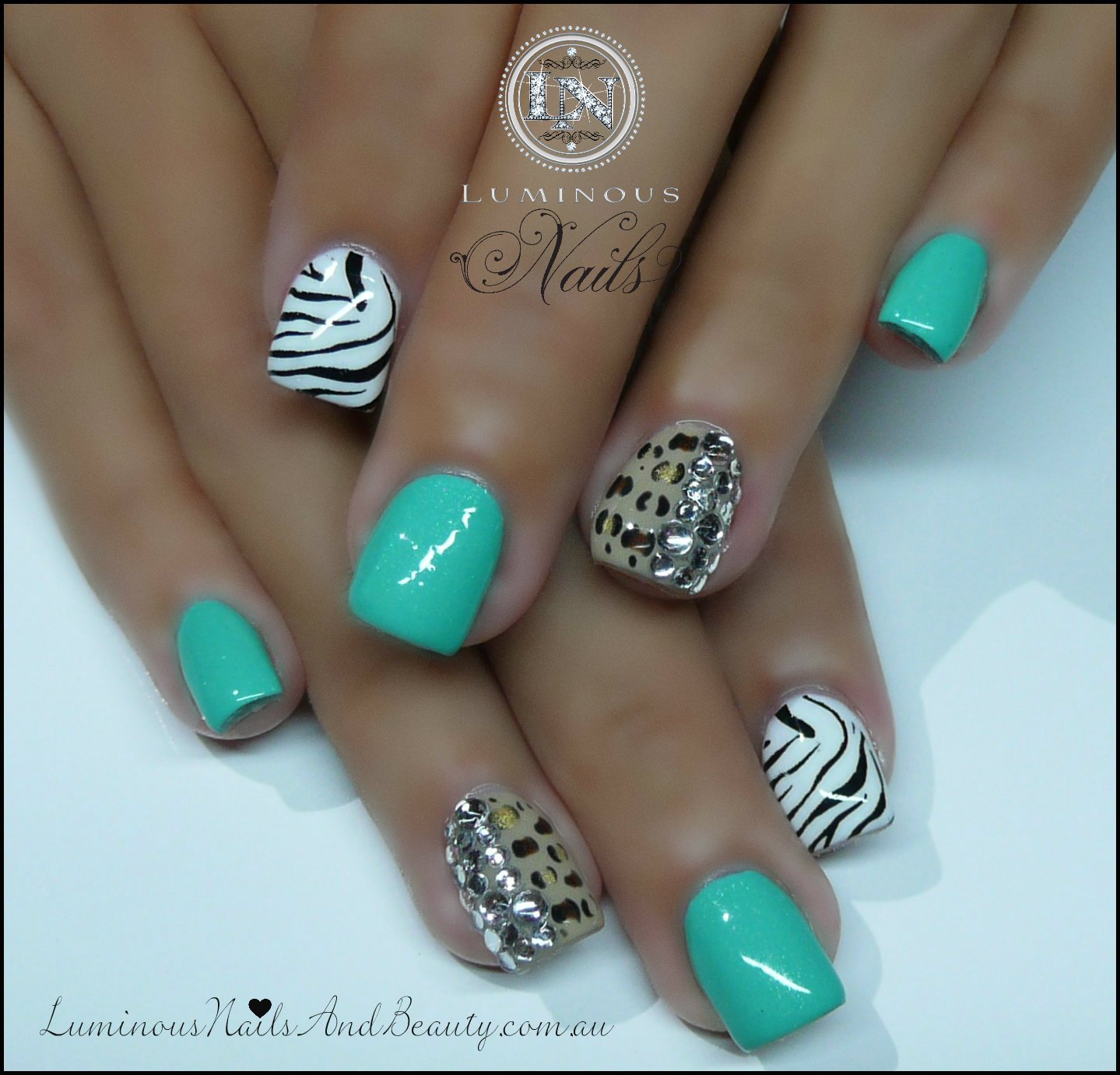 Mint nail design with crystals