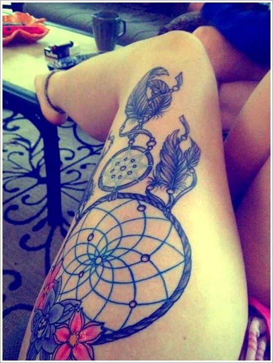 Dreamcatcher tattoo on the thigh