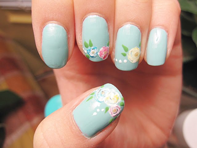 Light blue flower nail design