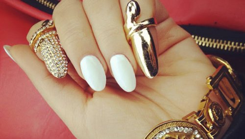 White and gold stiletto nails