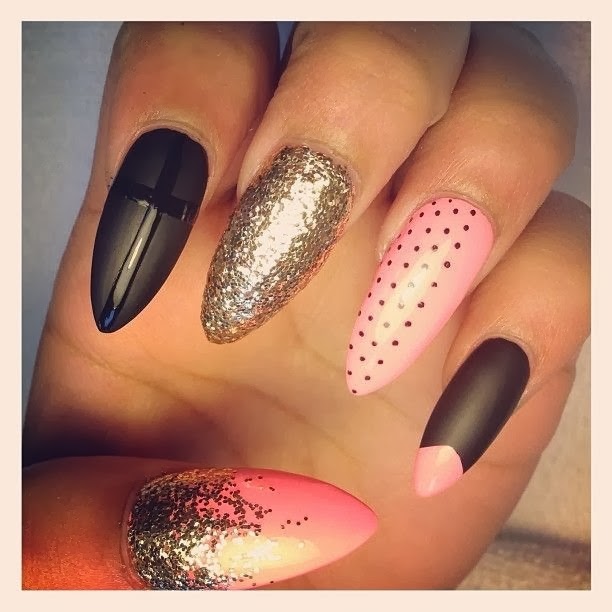 Gold decorated stiletto nails