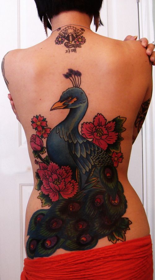 Peacock back tattoo