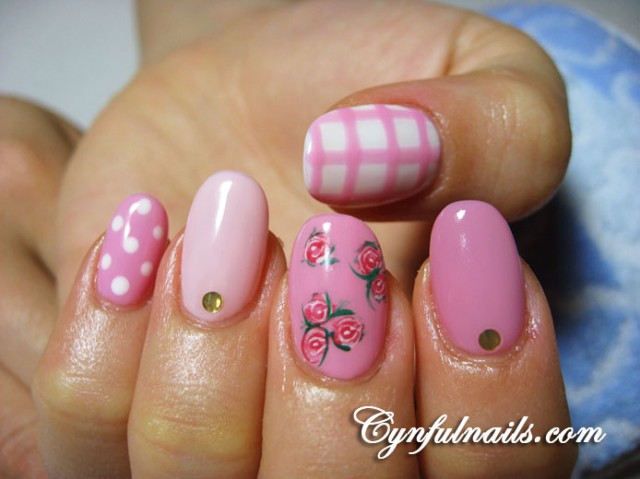 Pink patterned flower nail design