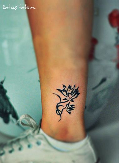 Ankle lotus tattoo