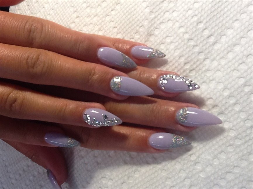 Purple embellished gemstone nails