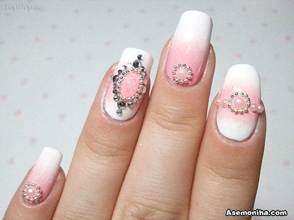 White decorated gemstone nails