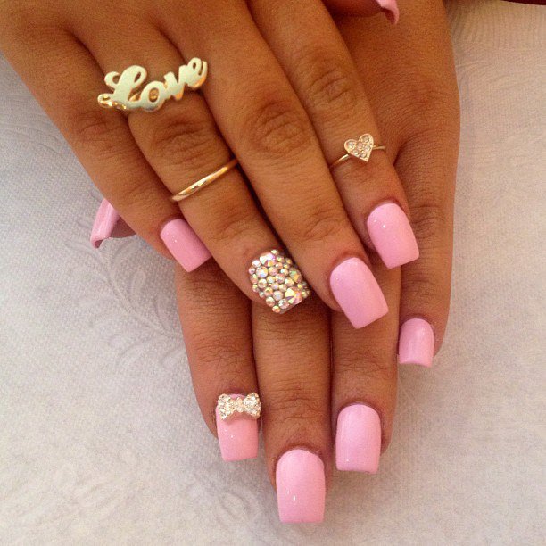 Pink decorated gemstone nails