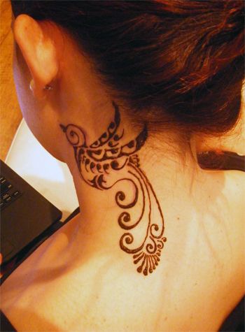 Bird neck tattoo