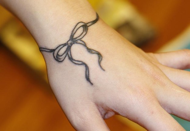 Pretty bow tattoo