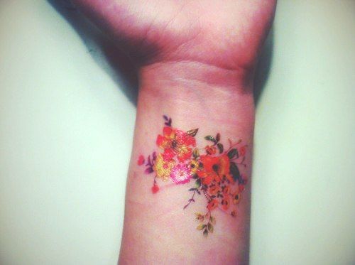 Colorful wrist tattoo