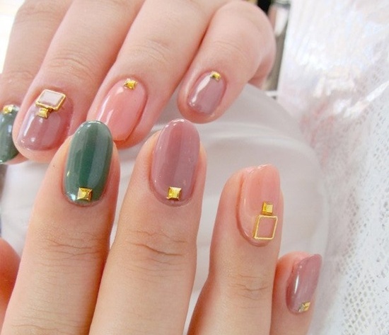 Peach and gold decorated nail art