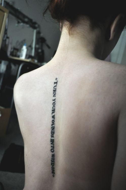 Quote tattoos on the back