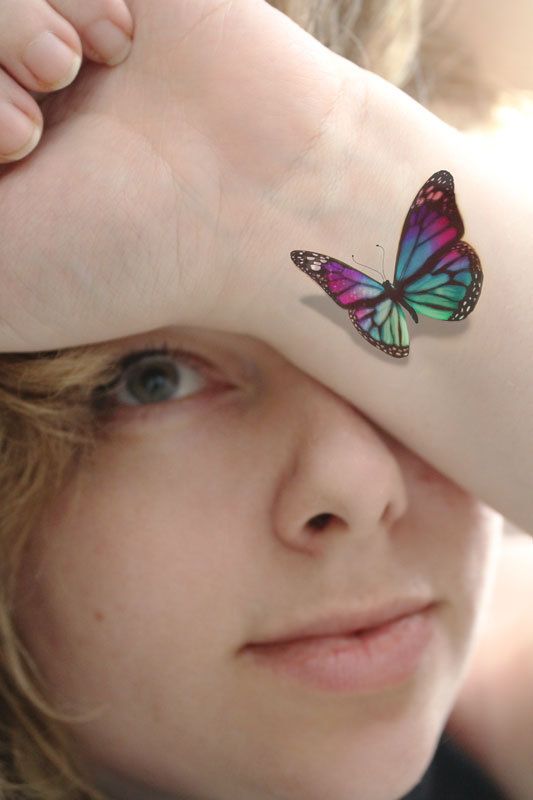 Wrist butterfly tattoo