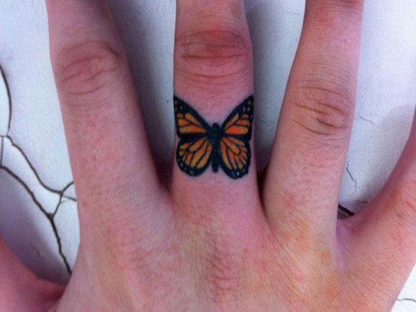 Beautiful butterfly tattoo on the finger