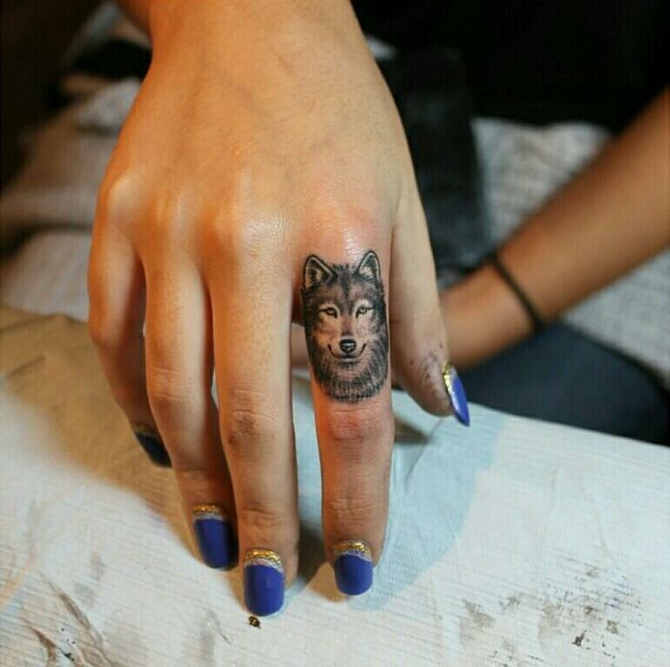 Finger animal tattoo