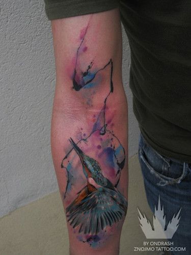 Flying bird tattoo