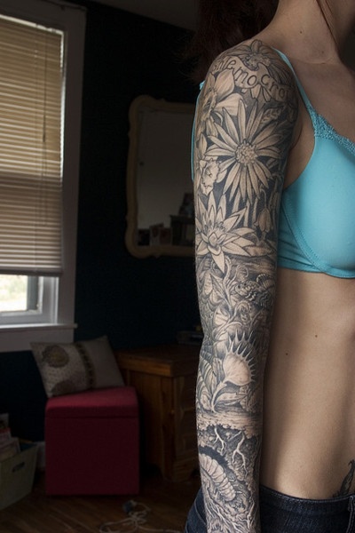 Flower arm tattoo