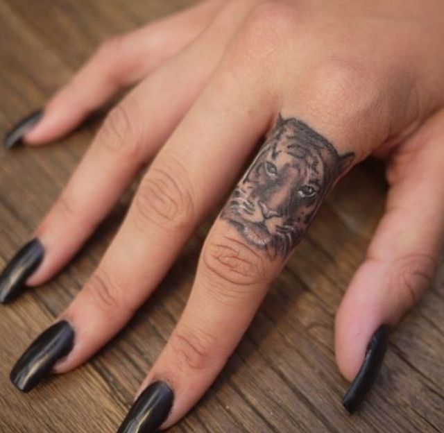 Edgy finger tattoo for women