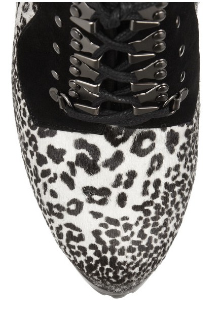 Front view of Alaïa calf hair with animal print and suede ankle boots