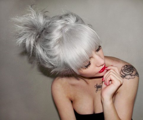 Messy Top Bun Hairstyle for Silver Gray Hair