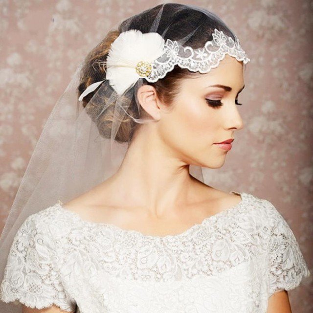 Wedding hairstyle with veil and hair pieces