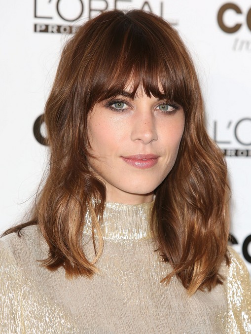 Alexa Chung medium wave hairstyle with blunt bangs