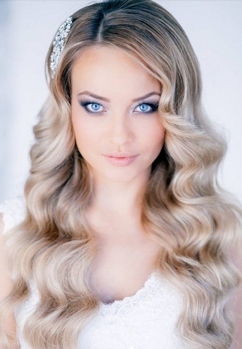 Noble wedding hairstyle for long, wavy hair