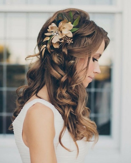 Glamorous half up half down hairstyle for the wedding