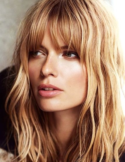 Long layered hairstyle with bangs
