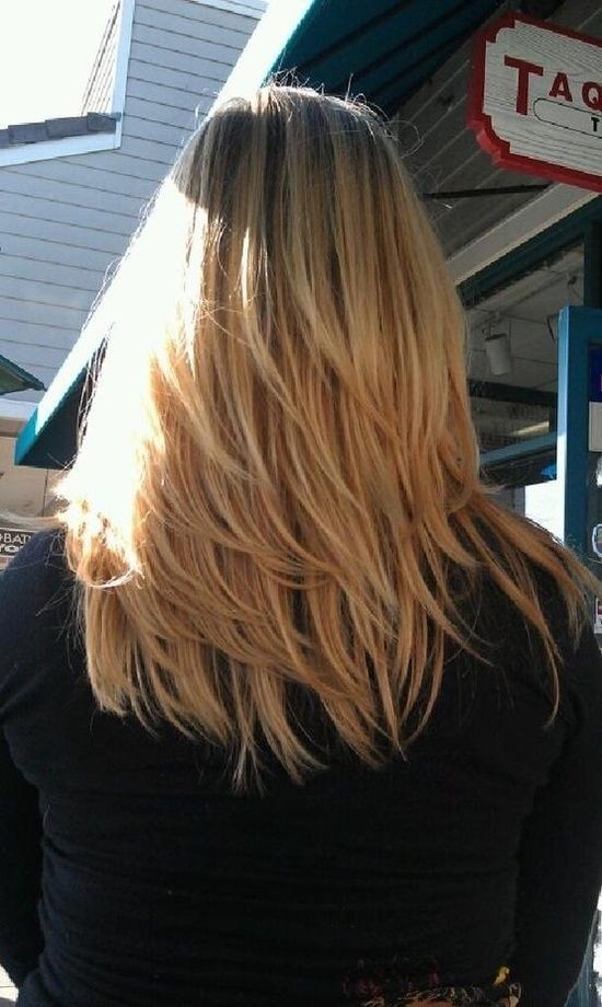 Long layered blonde hairstyle