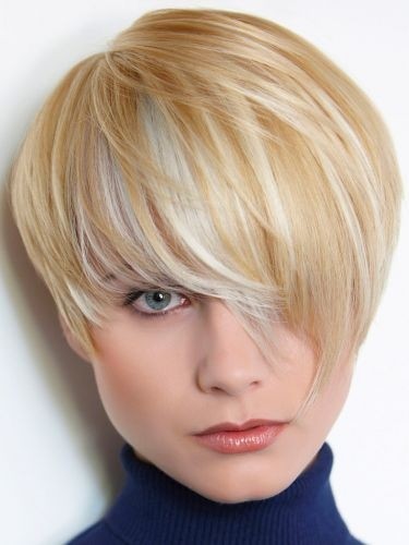 Short blonde haircut with long side bangs