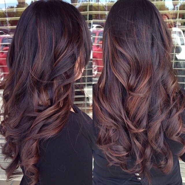 Long wavy hairstyle highlighted in red