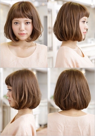 Short bob haircut with blunt bangs