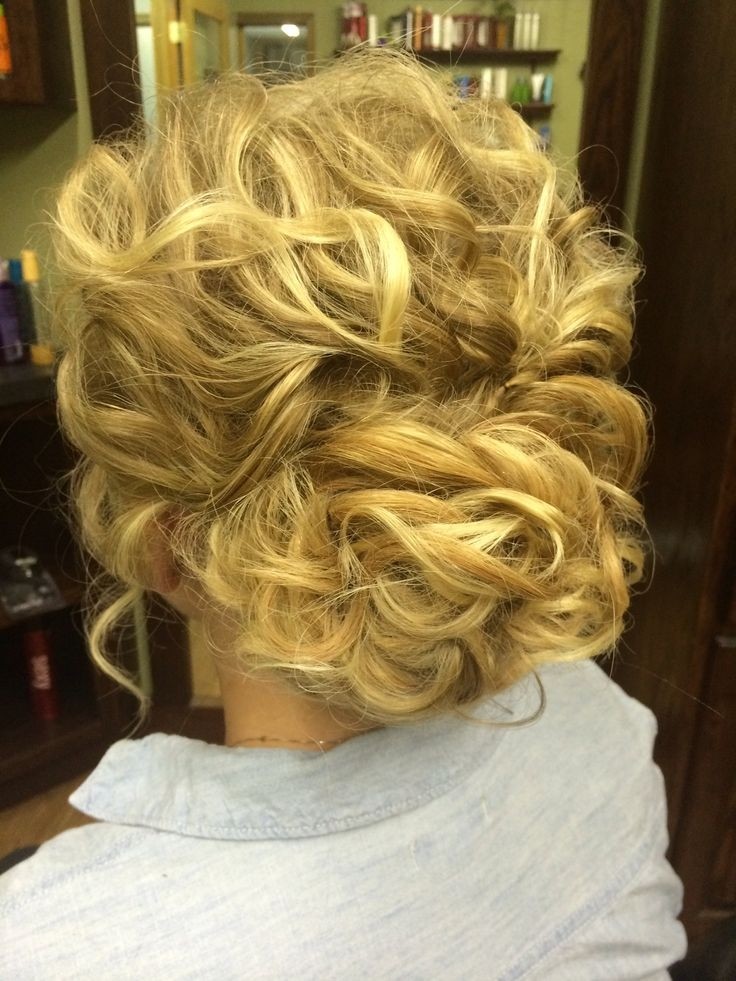 Chaotic updo for curly hair