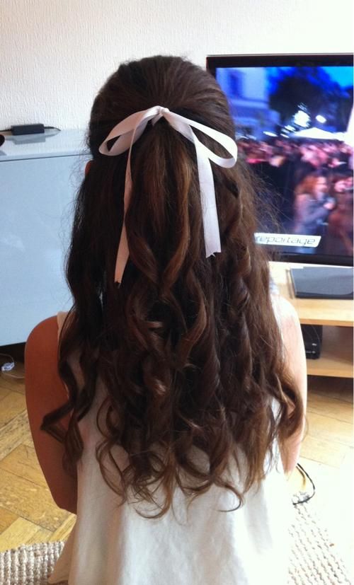 Curl with a white ribbon